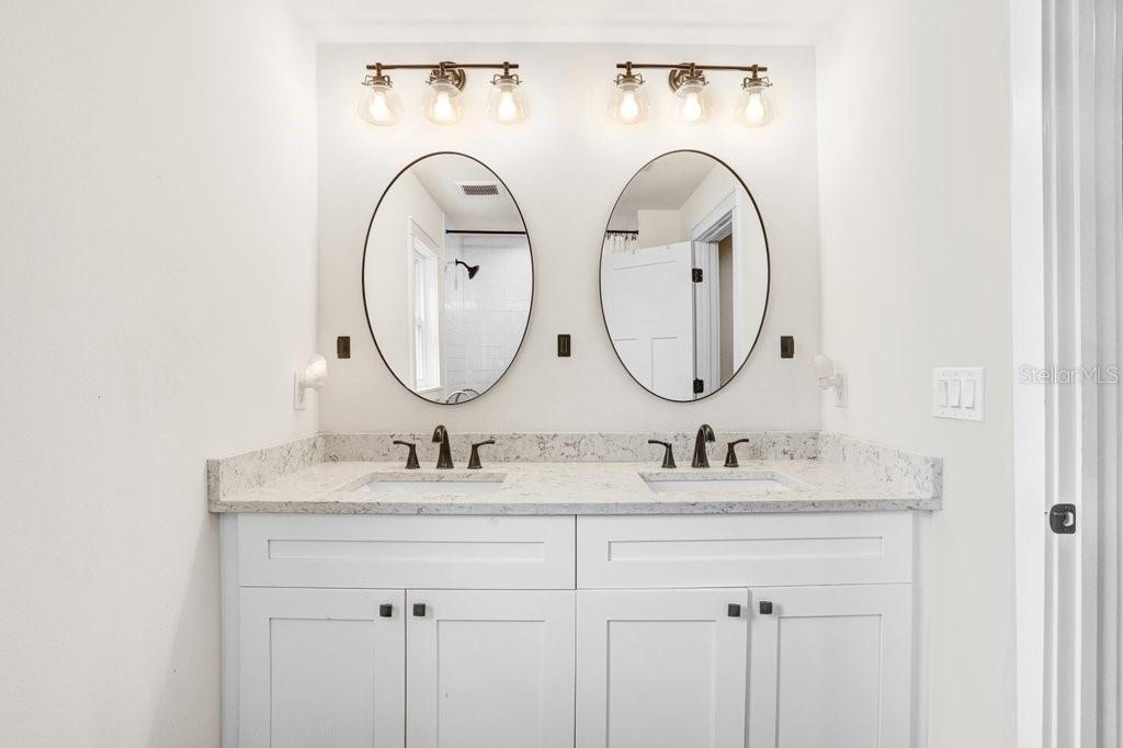 View of sinks in second bathroom