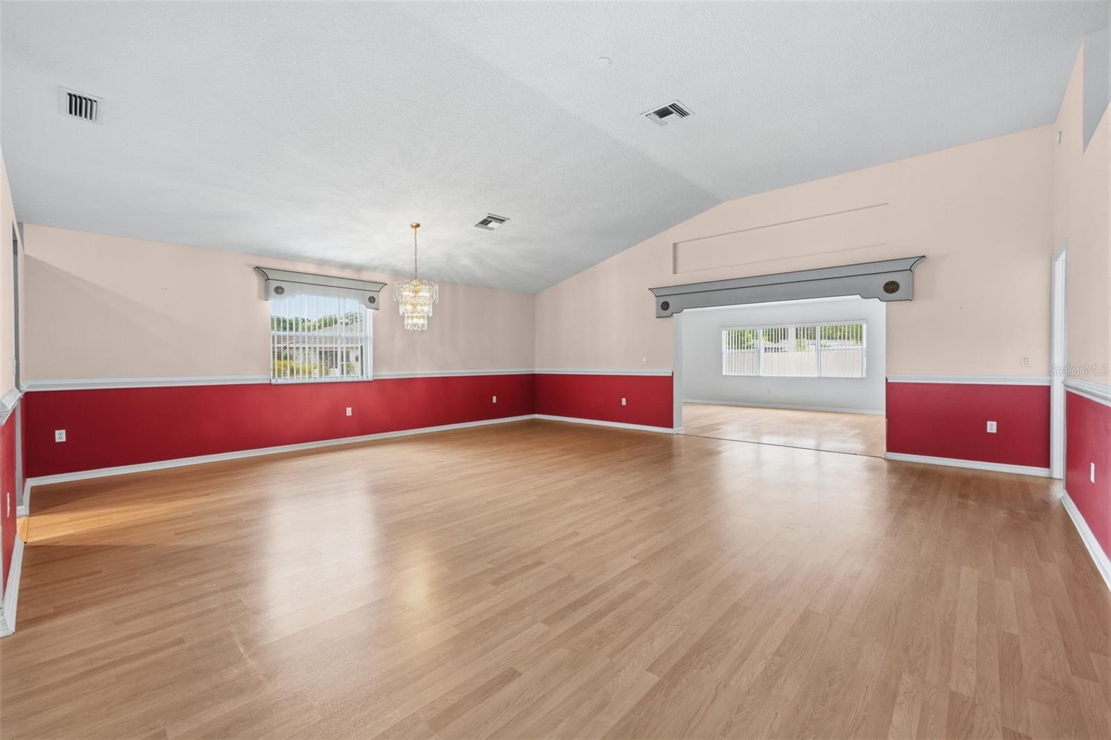 Large and bright Dining and Living room combination. Neutral flooring in perfect condition.