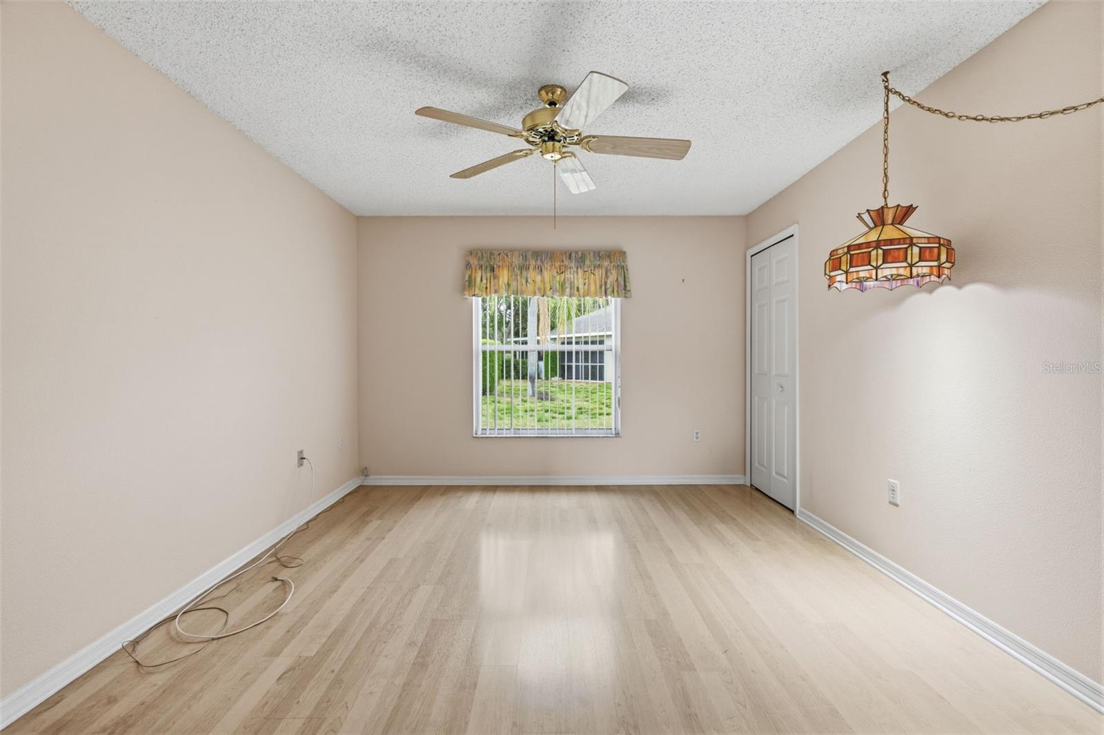Bedroom two off of the living area with double door entry.