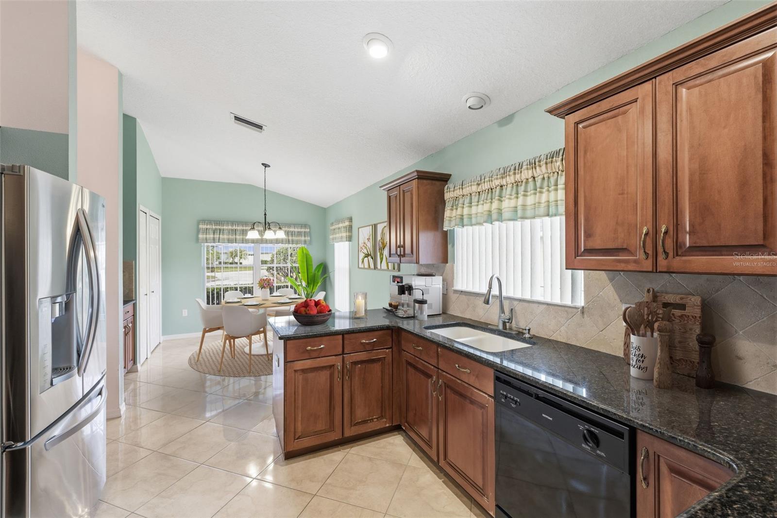 Virtually Staged. Comfortable breakfast nook with abundant natural light.