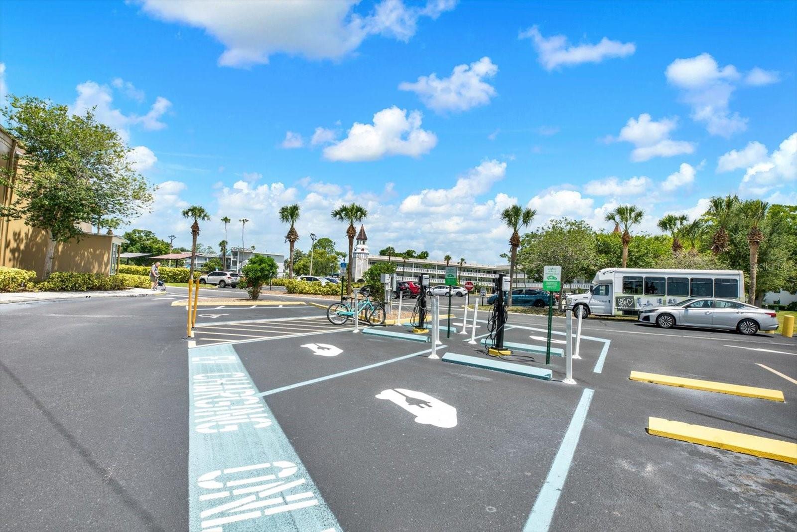 Community parking with EV charging stations.