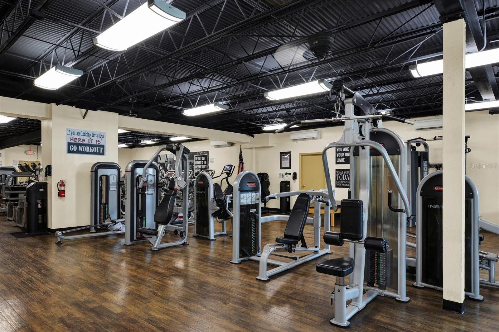 Community fitness center with full gym equipment.