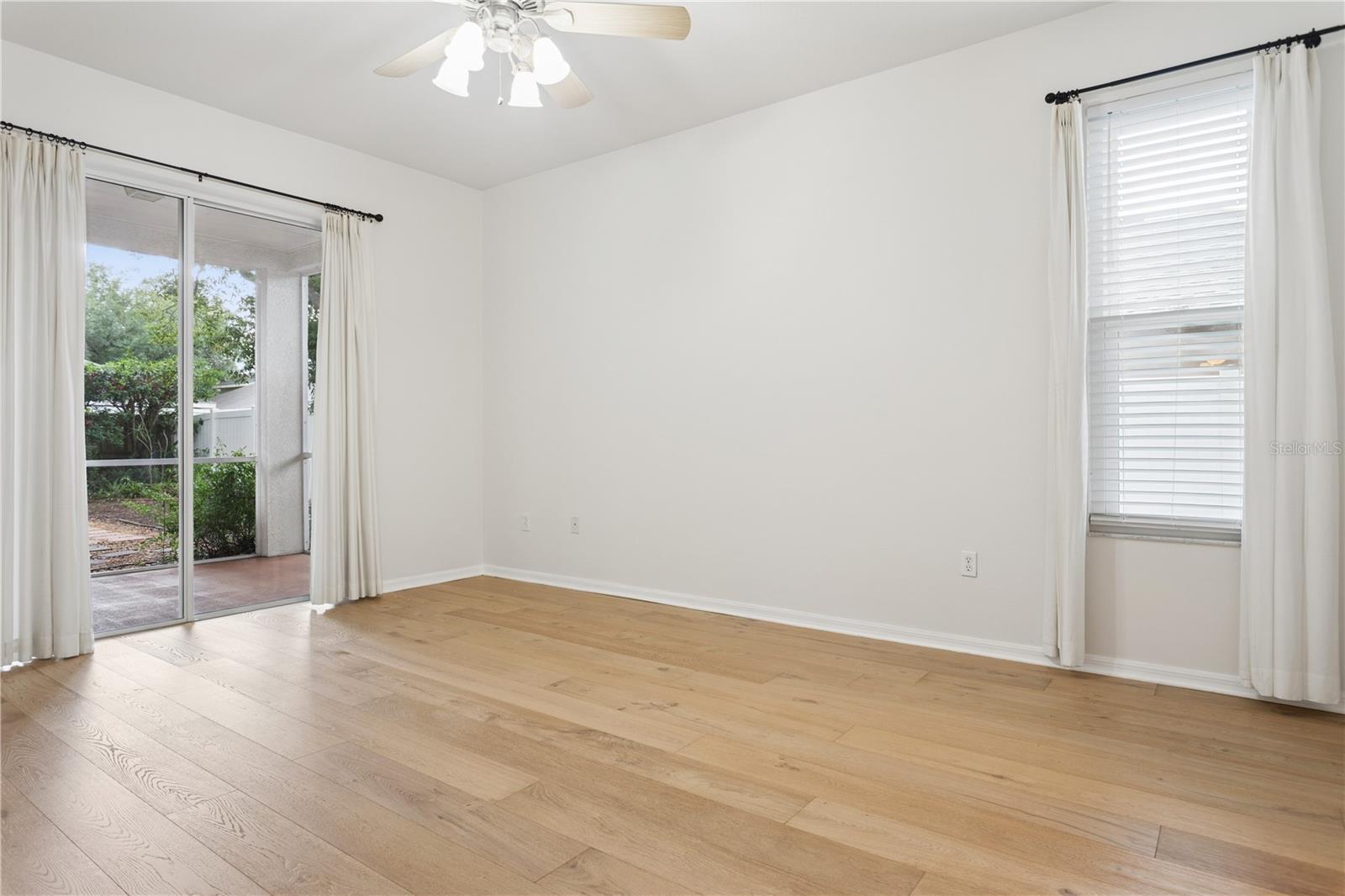 Master Bedroom with sliders to screened/covered lanai