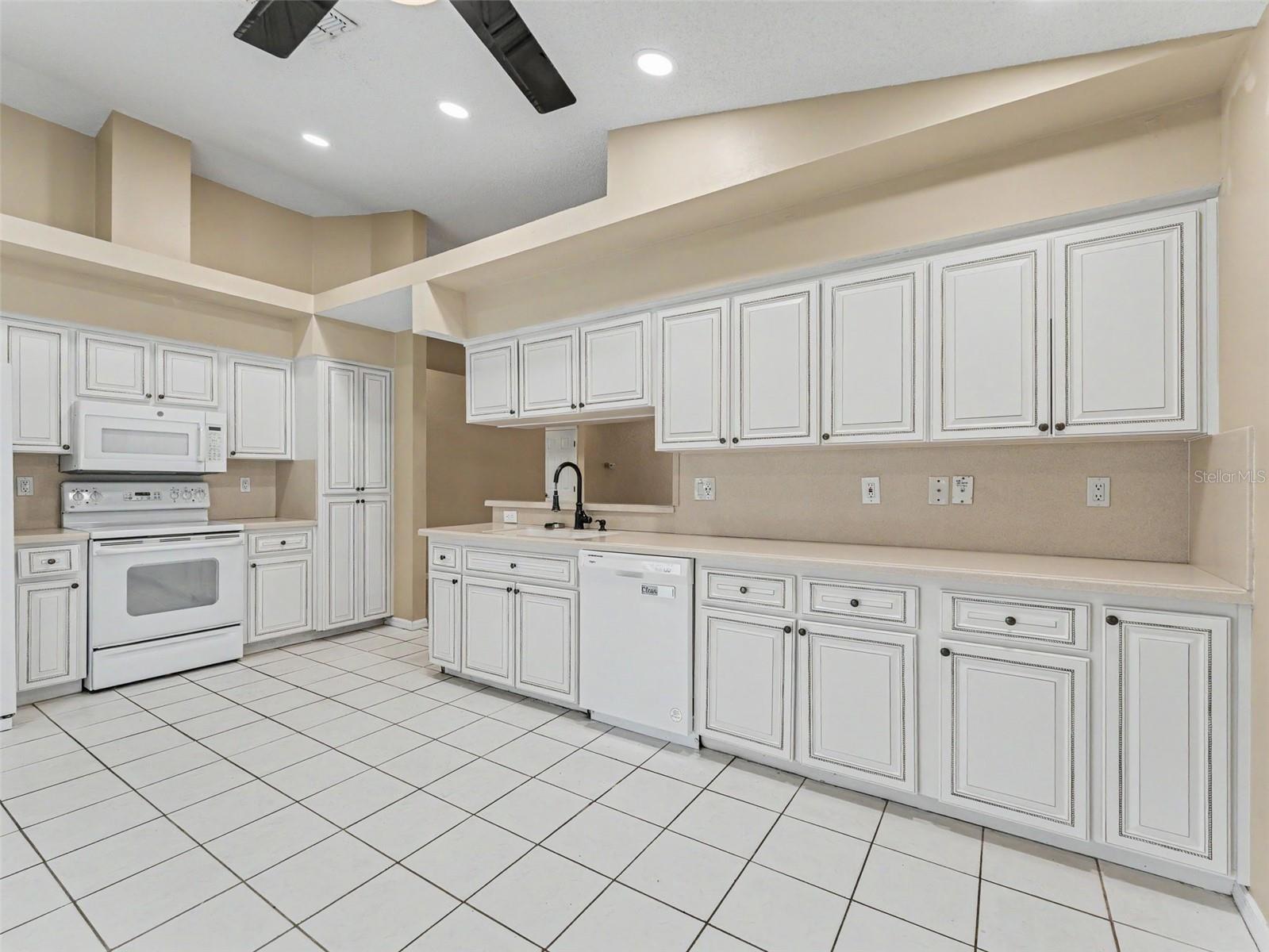 Kitchen features tons of cabinets