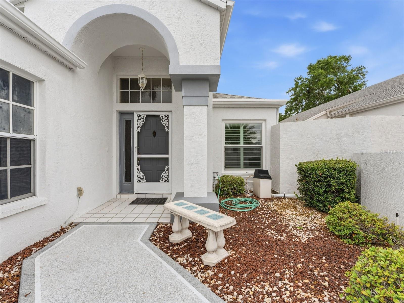 Covered entryway in private courtyard