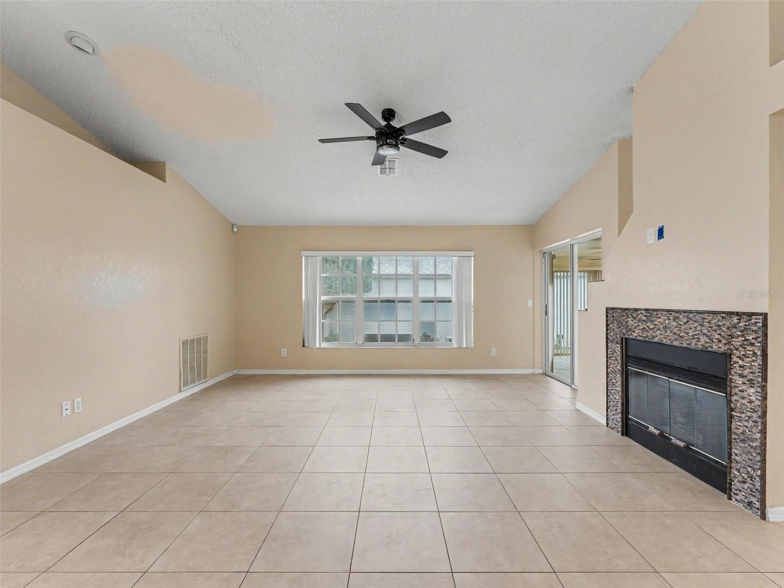 Living Room with 2 sided fireplace