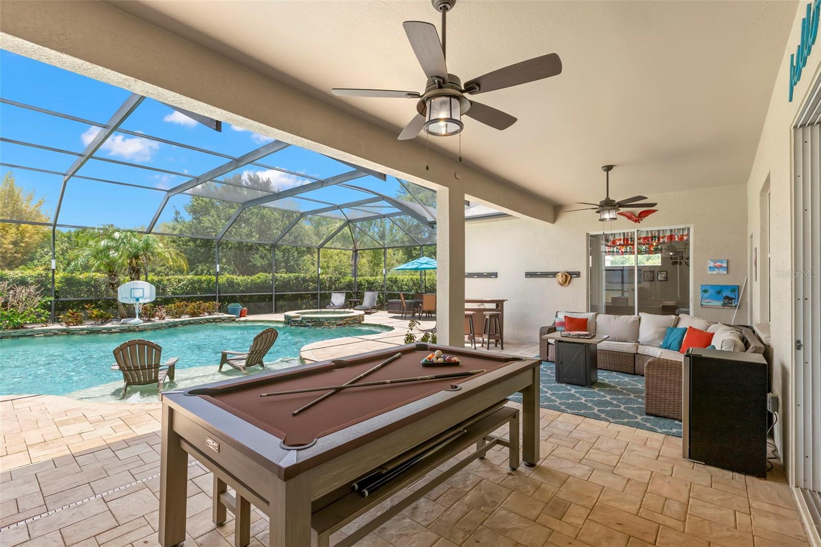 Covered Lanai showing Sliders to Fifth Bedroom