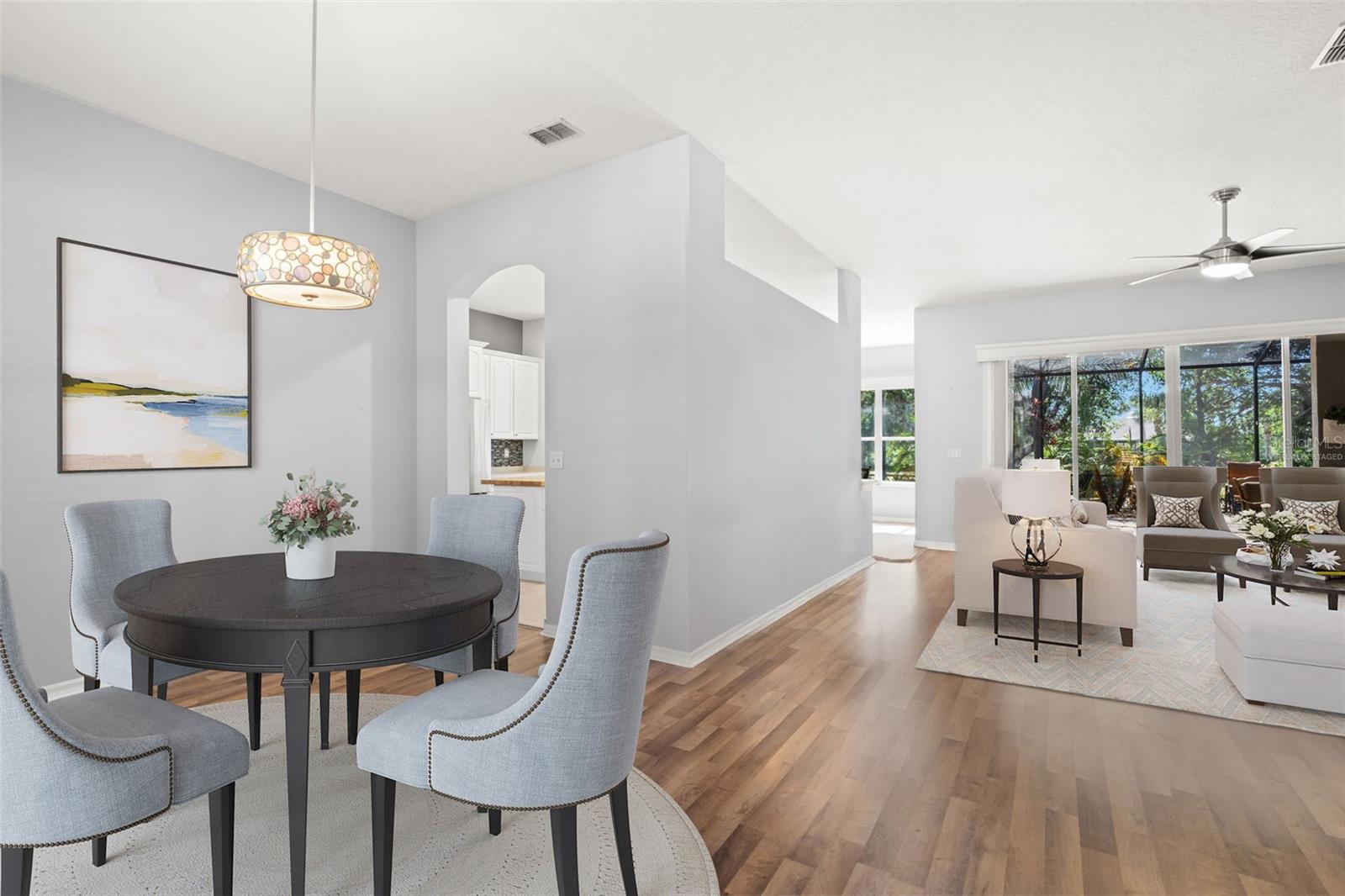 Virtually Staged - Dining Room and Living Room with Kitchen Access