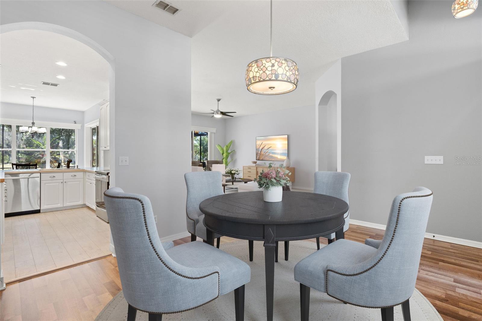 Virtually Staged - Dining Room and Living Room with Kitchen Access