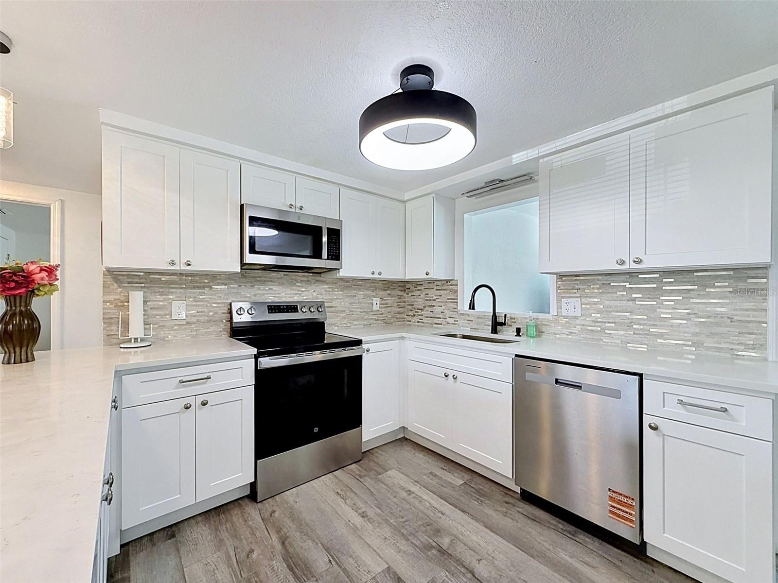 Generous countertop space perfect for entertaining.