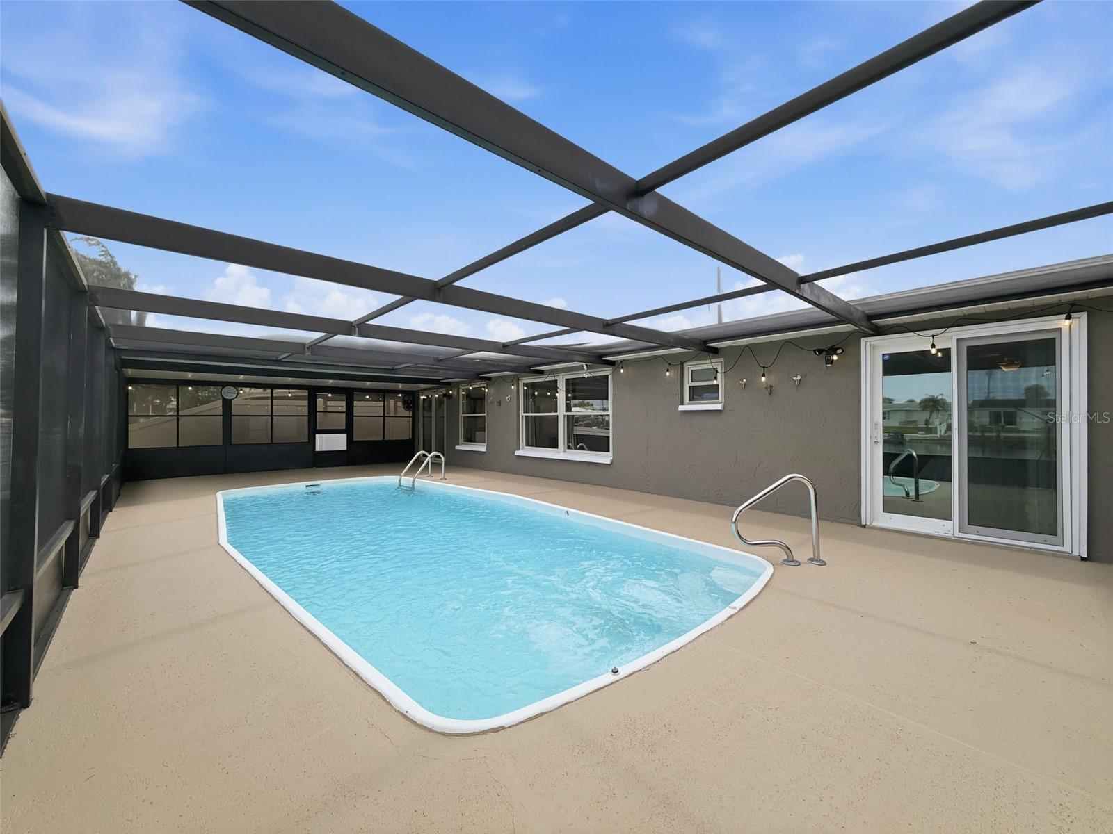 Enjoy waterfront breezes from the comfort of your screened lanai.