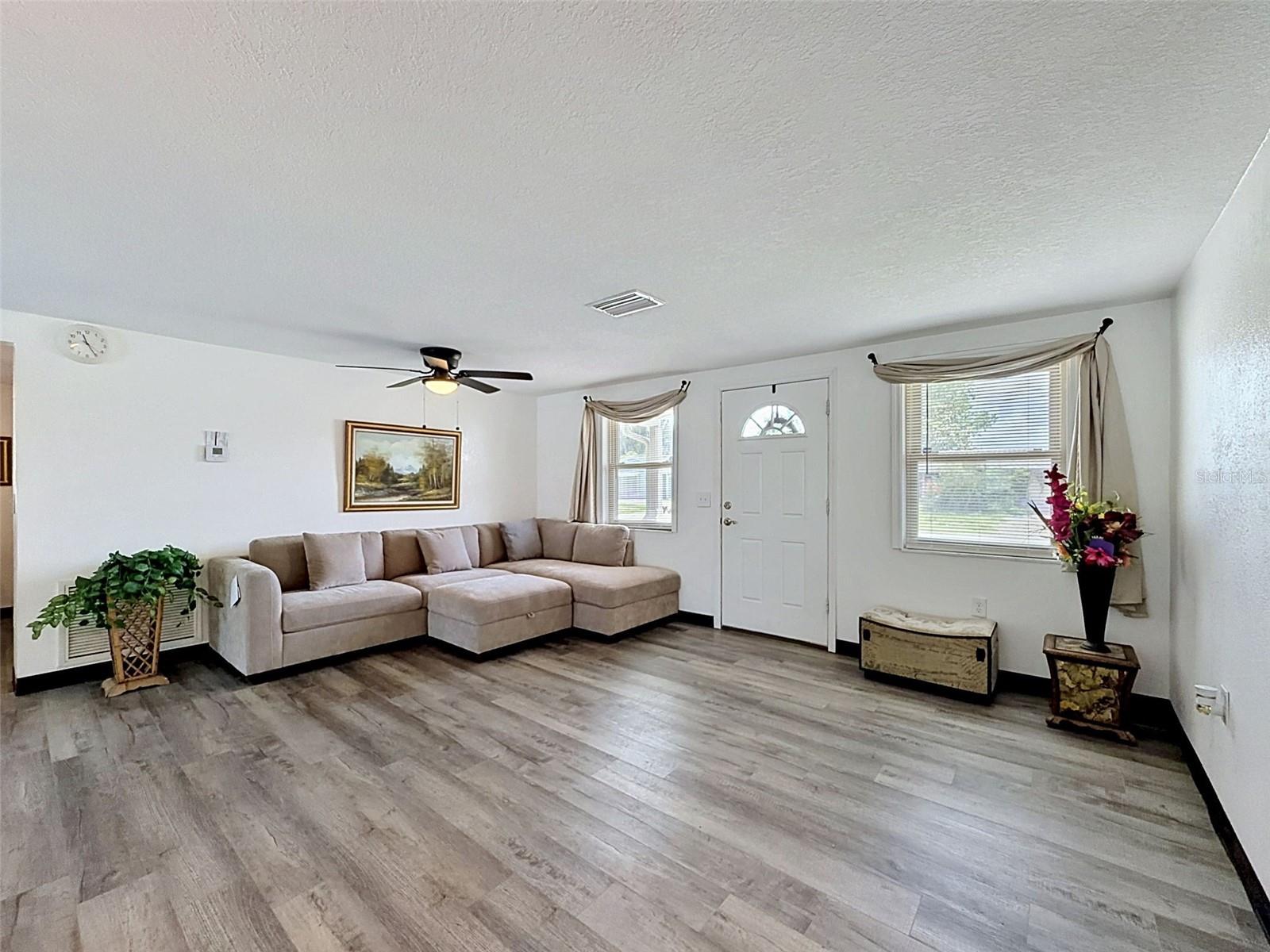 Freshly painted with luxury vinyl plank flooring.