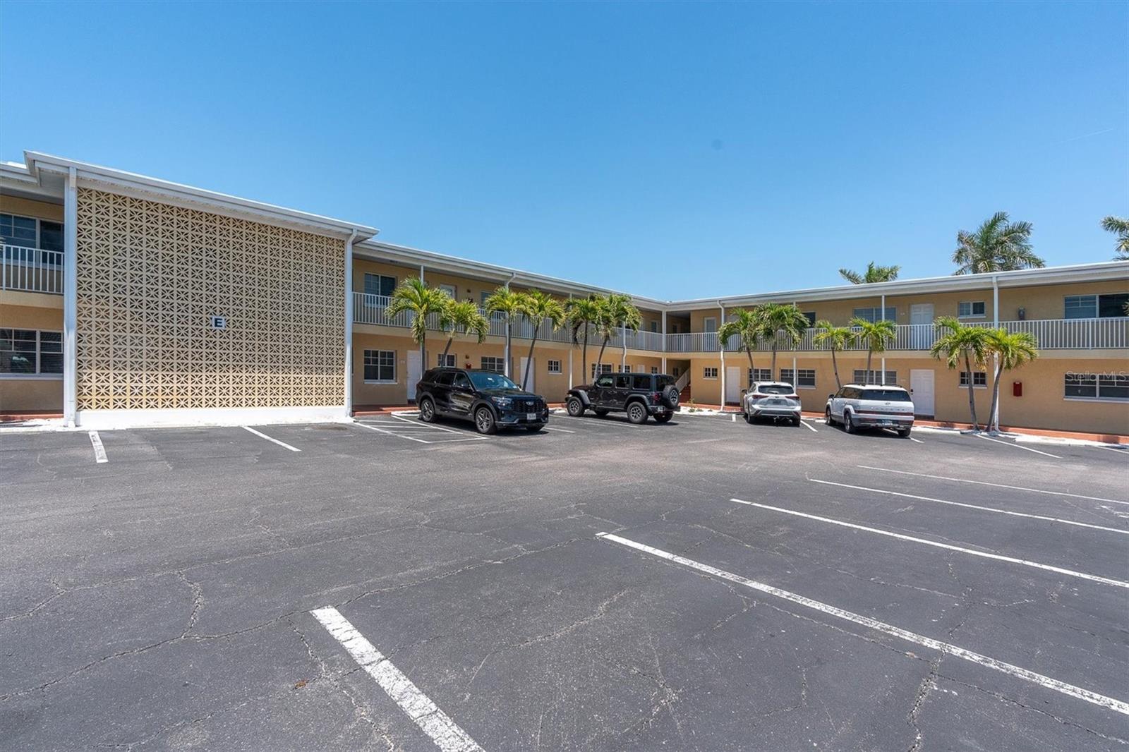 Front of building with parking