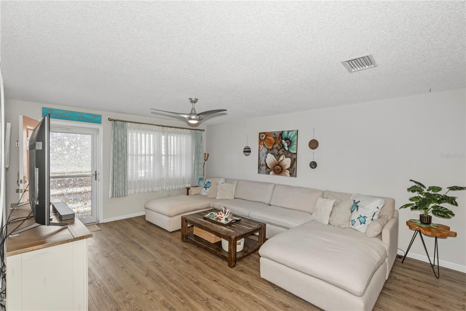 Lots of natural light and window treatments included for privacy
