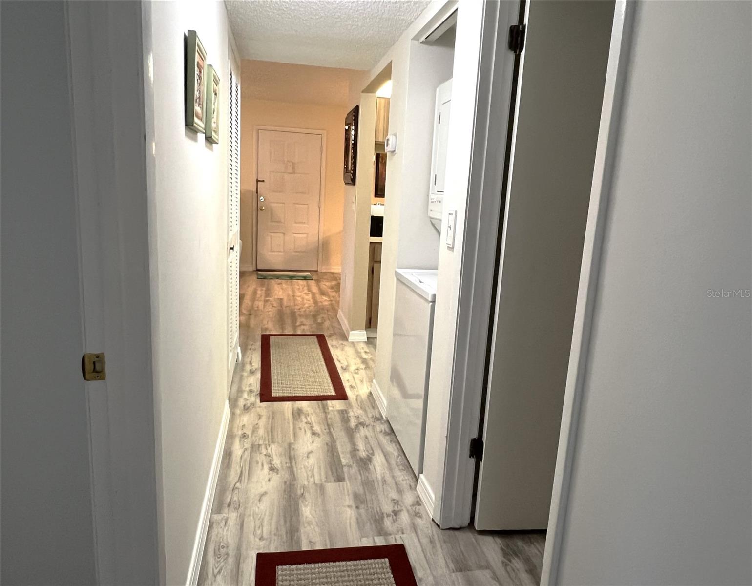 HALLWAY FROM PRIMARY BEDROOM SUITE