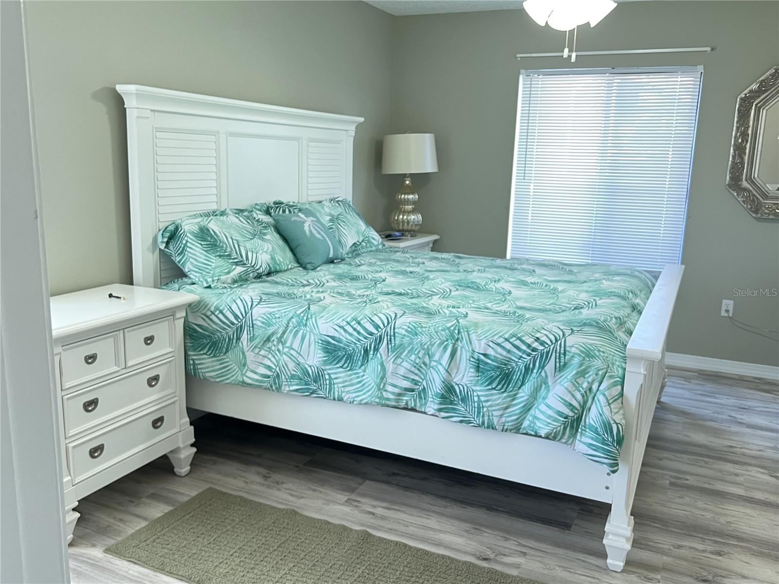 PRIMARY BEDROOM W/HAS BEAUTIFUL WHITE BEDROOM FURNITURE