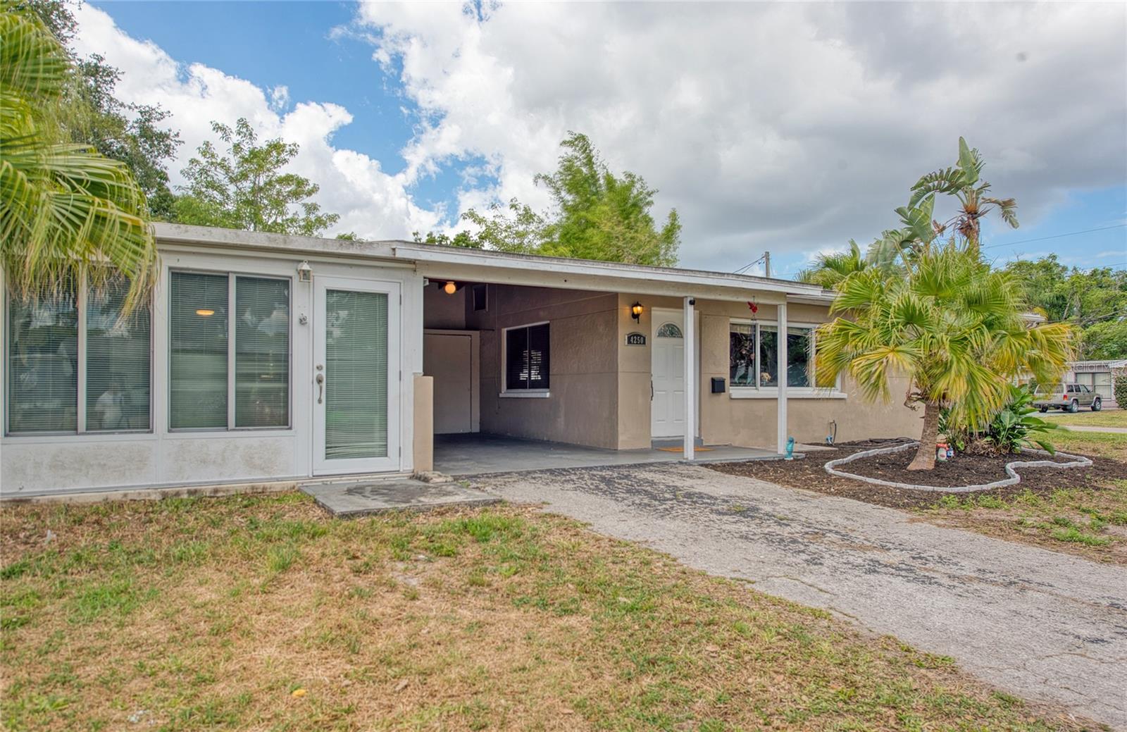 Private Driveway w/ Carport