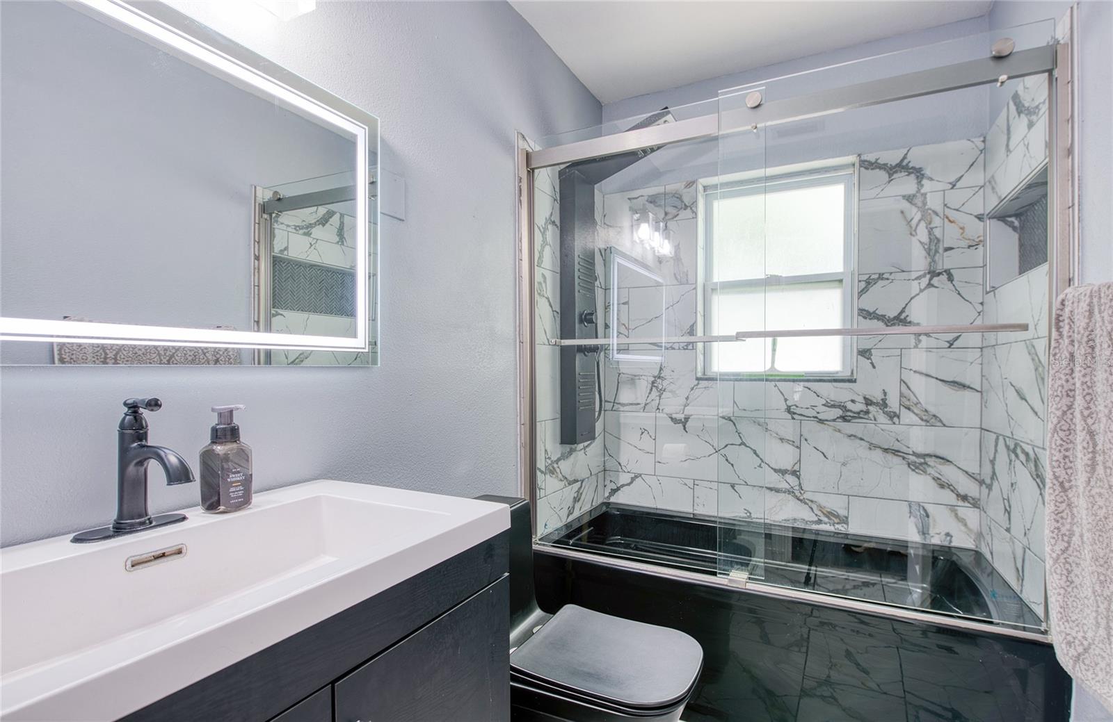 Updated Bathroom w/ Tub and Shower Combo