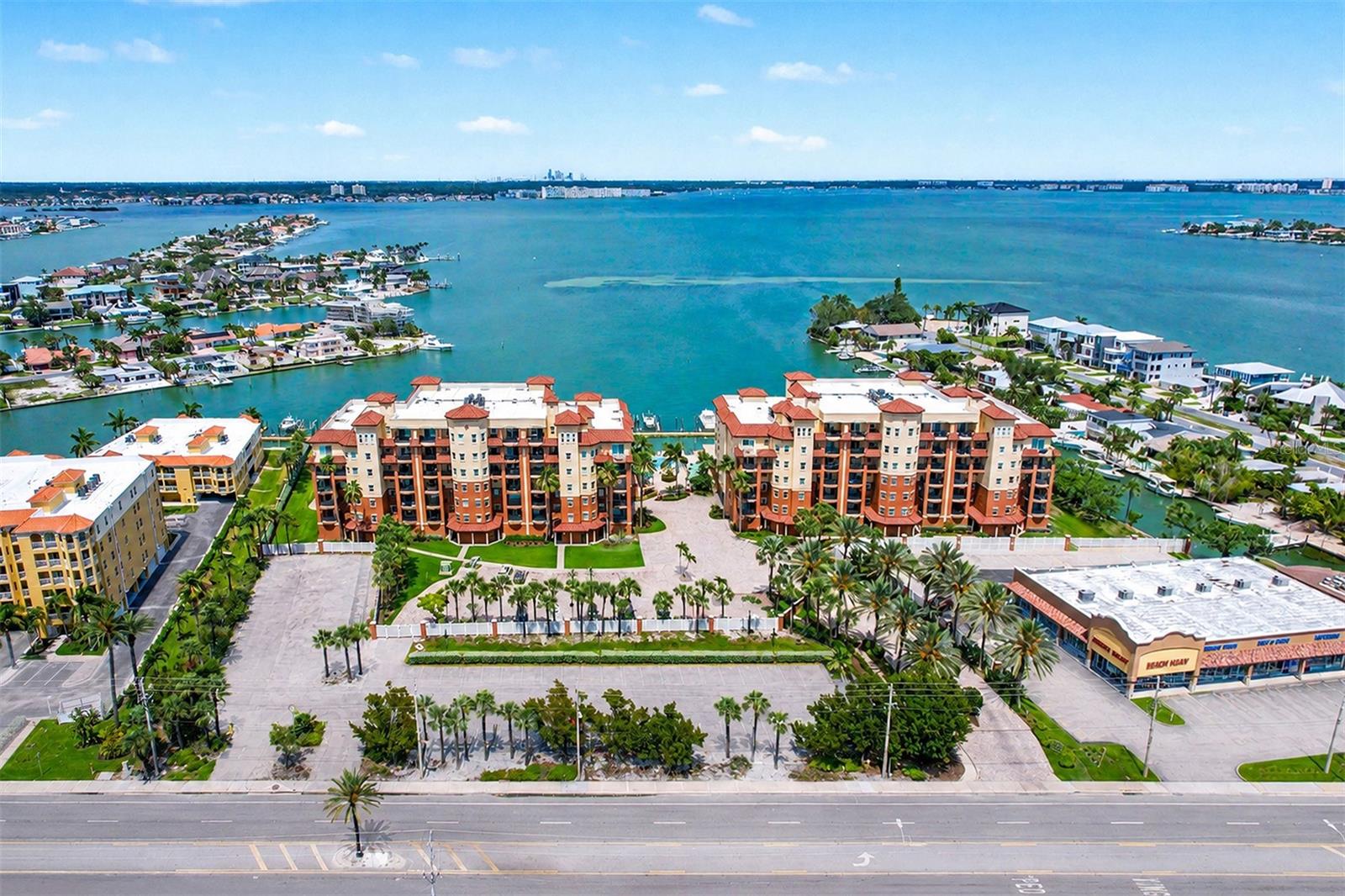 Building from Gulf Blvd with Boca Ciega Bay at Rear