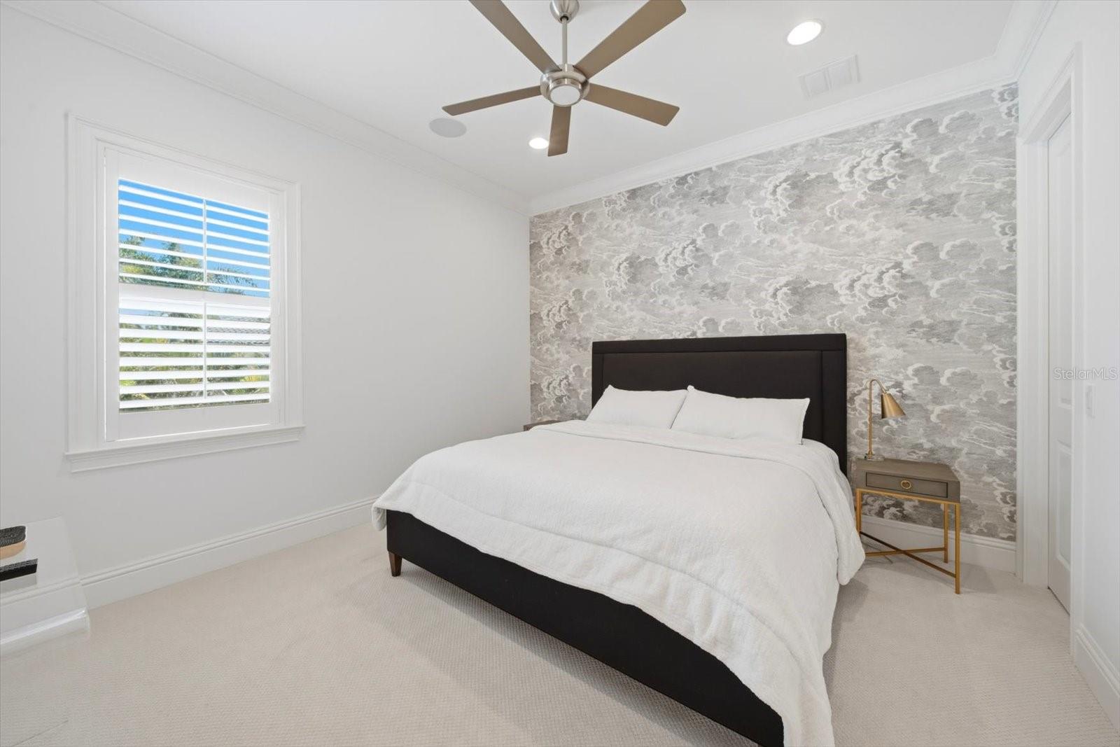 third bedroom with custom wallpaper