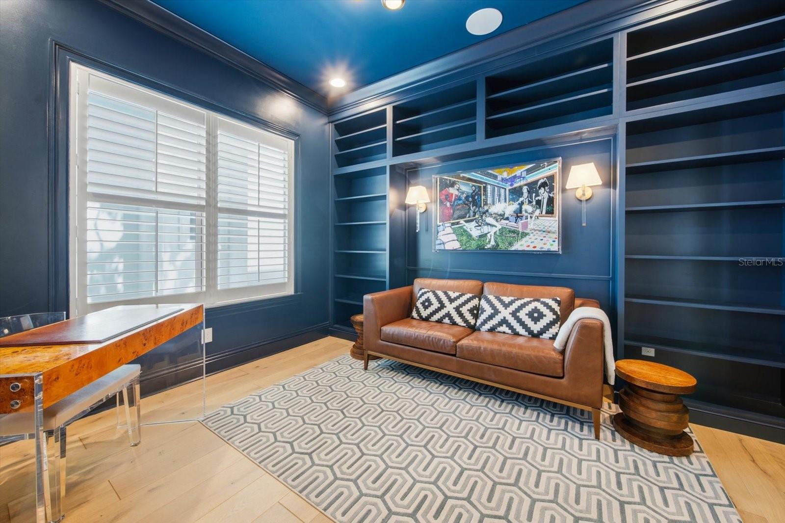 double door private office with built-ins