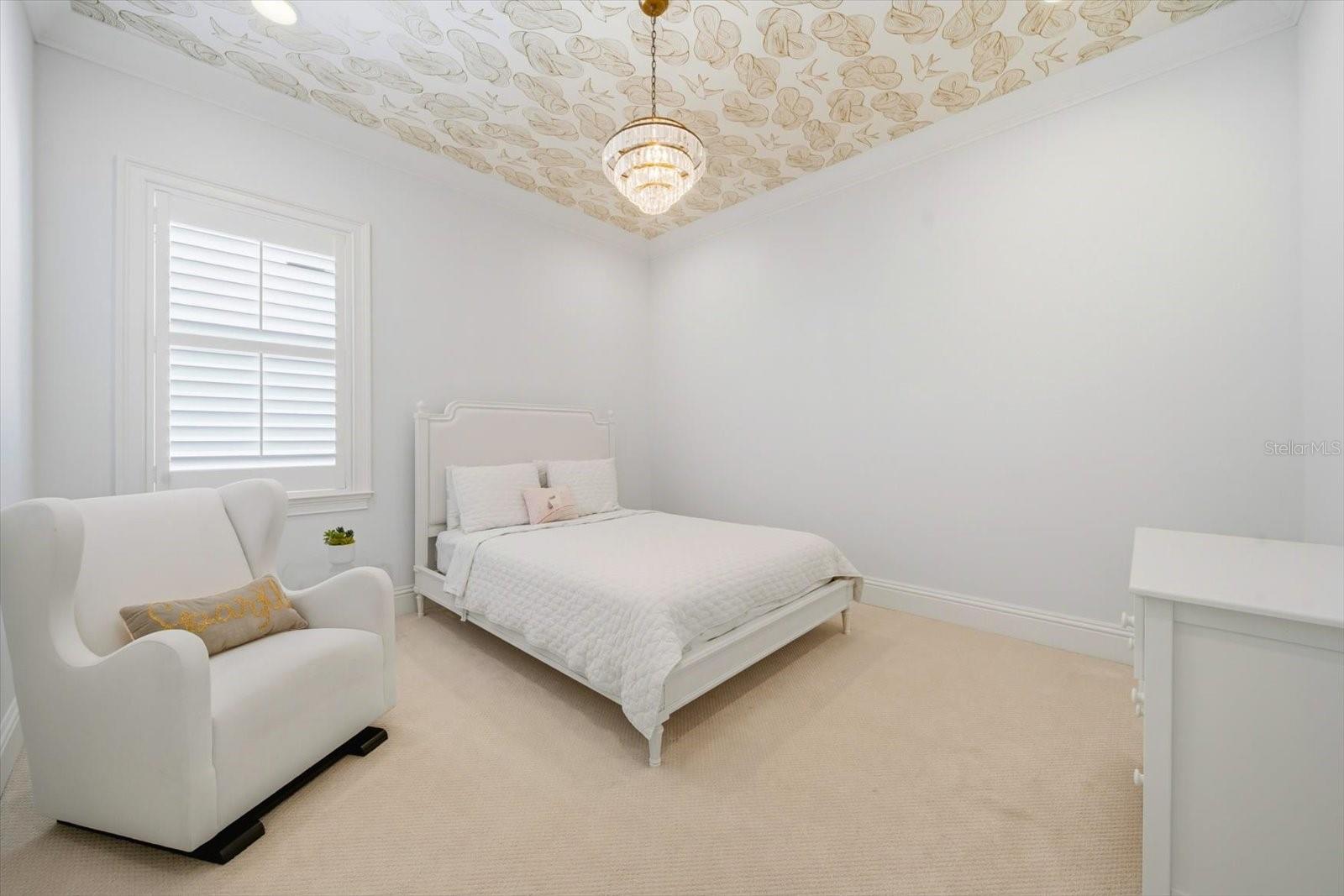 fourth bedroom with custom ceiling wallpaper