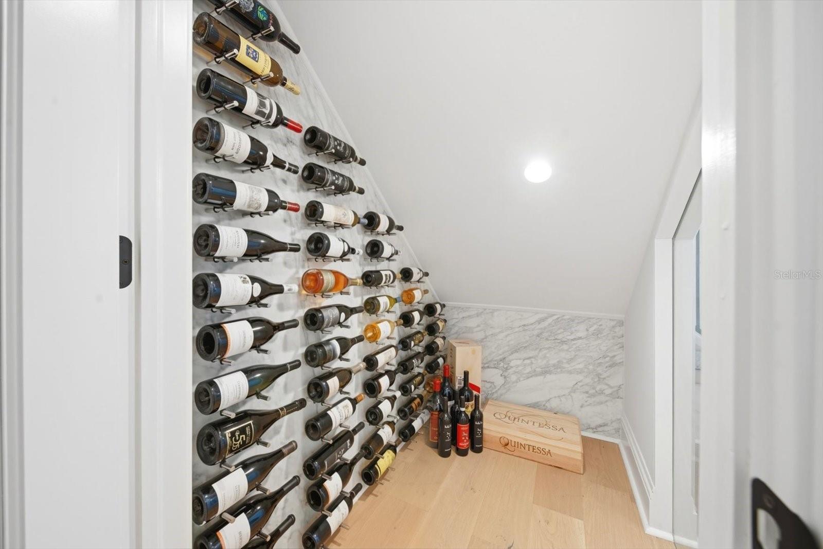 additional wine cellar underneath stairwell