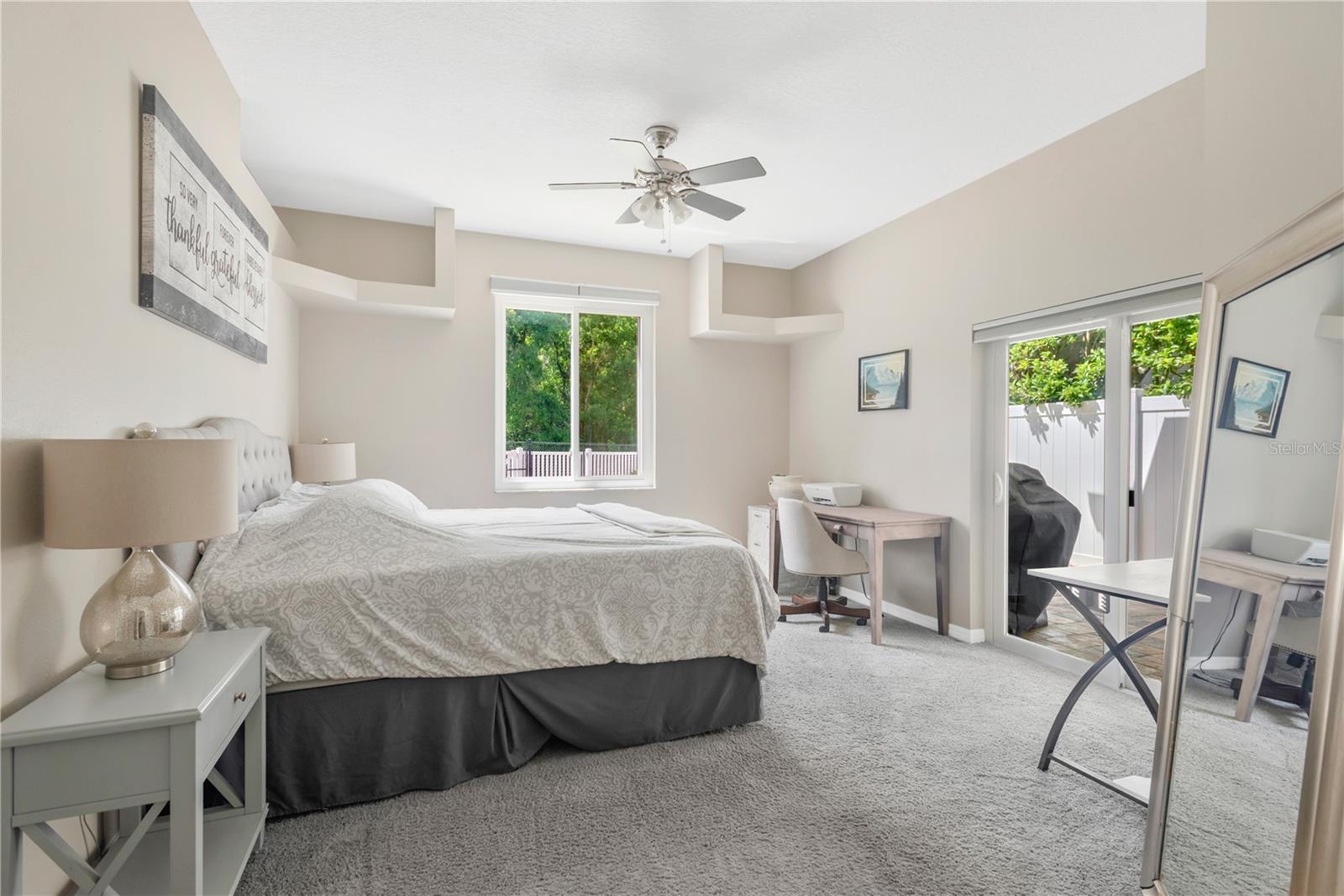Primary Bedroom with Sliders out to Patio