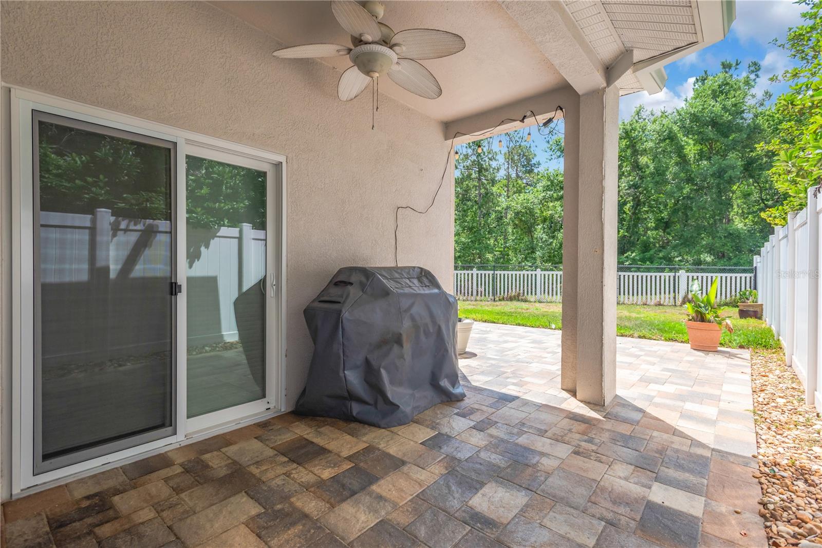 Covered Patio with Pavers and Conservation View