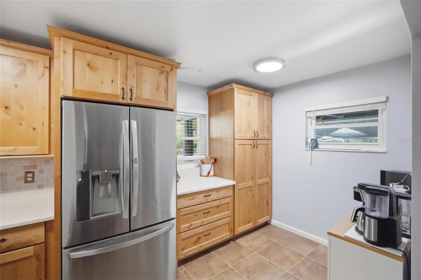 Kitchen with wood cabinets