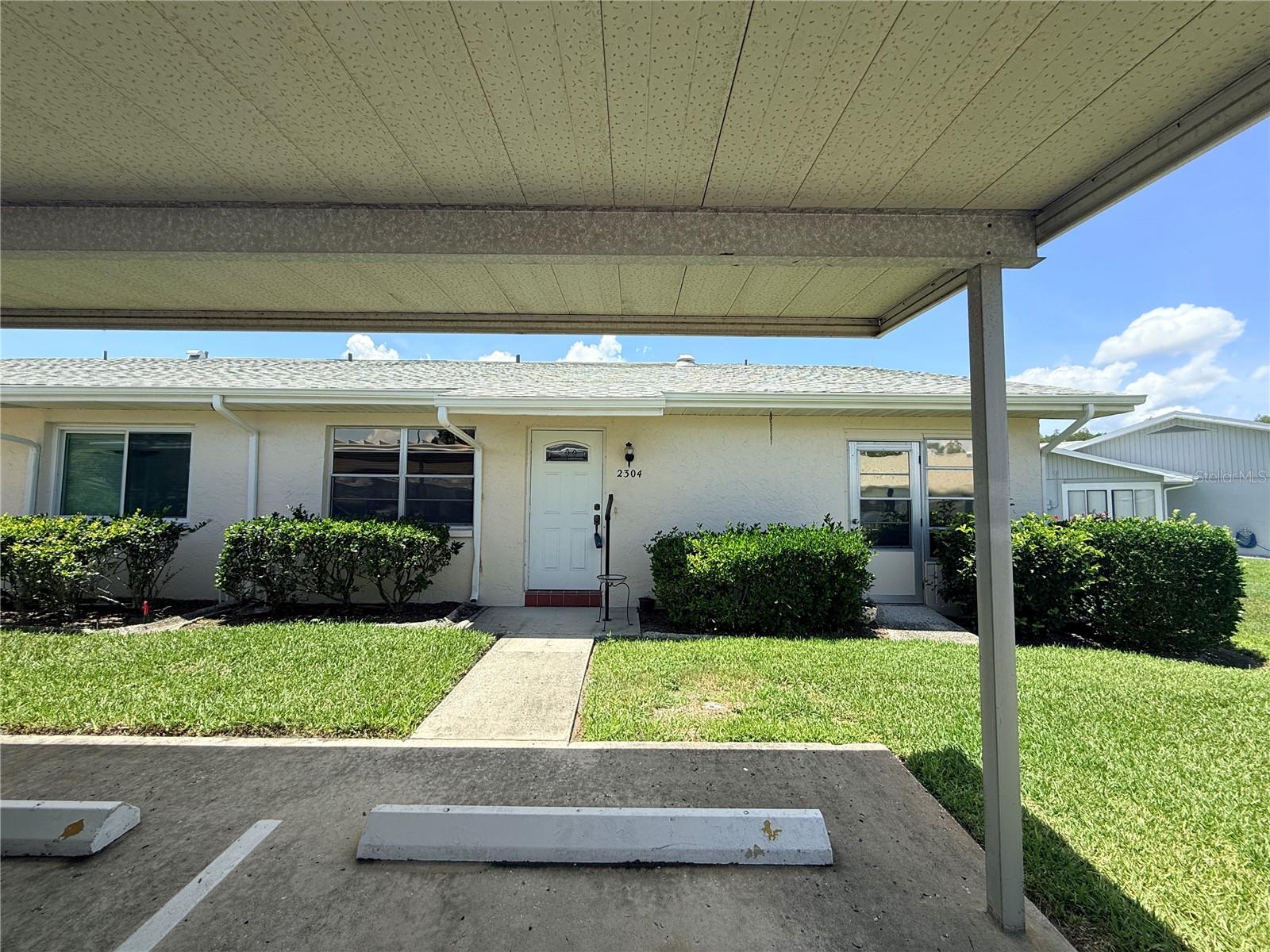 Welcome Home with 2 space carport