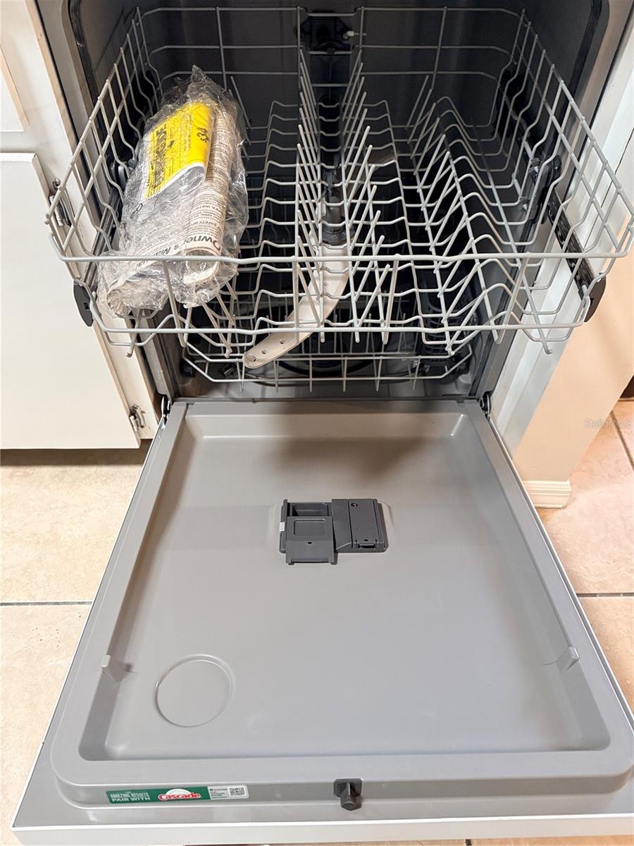 Brand new dishwasher never been used.