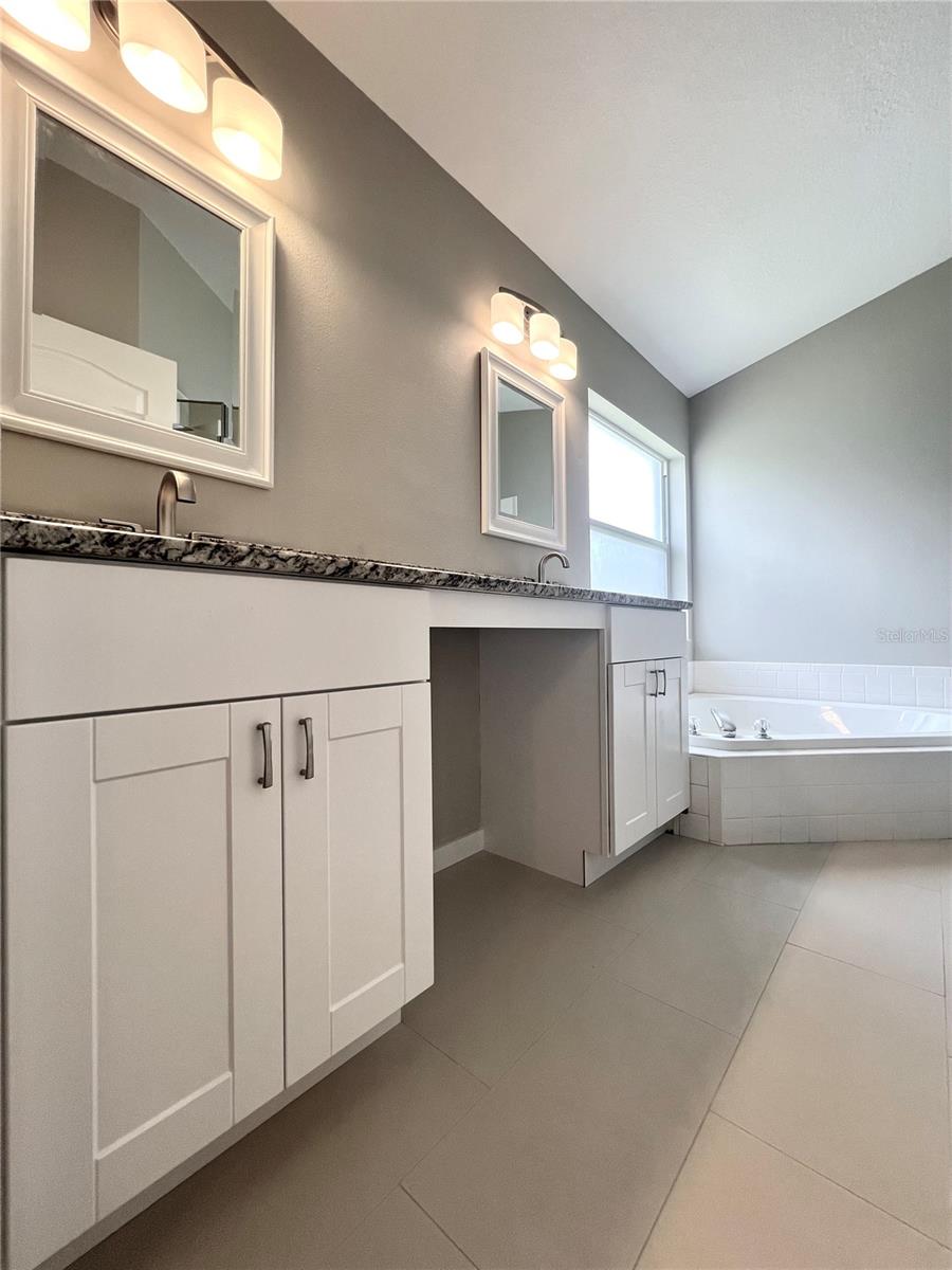 Double vanity and granite counters
