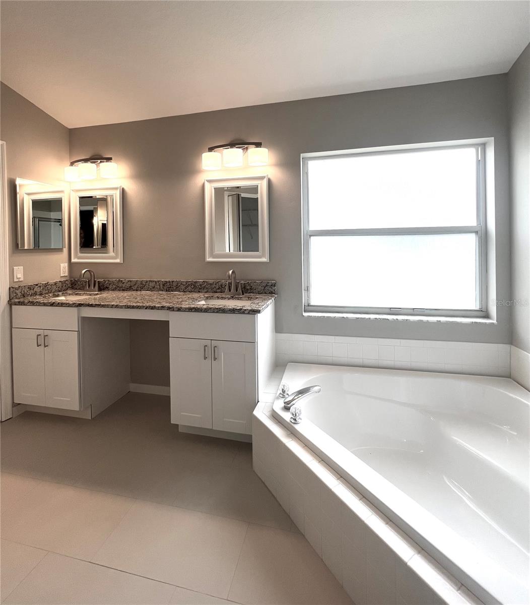 Double vanity and garden bath