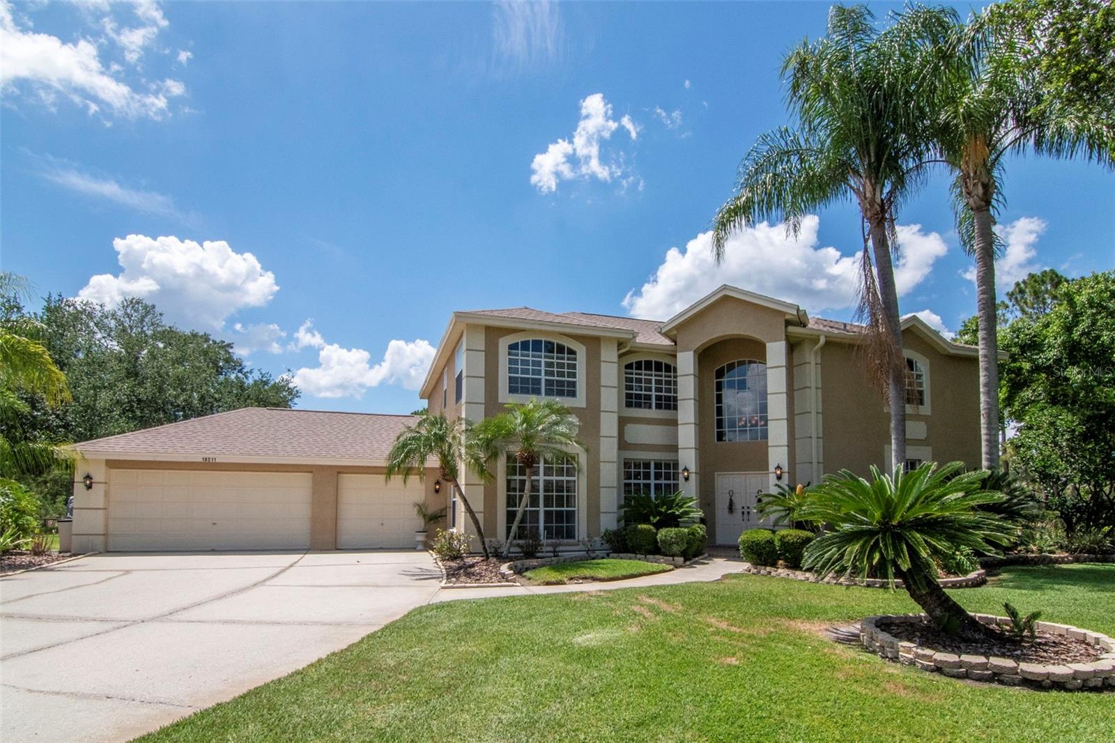 Front View with Extended Driveway