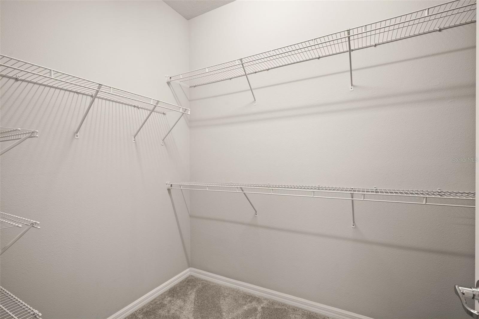 primary bedroom walk in closet