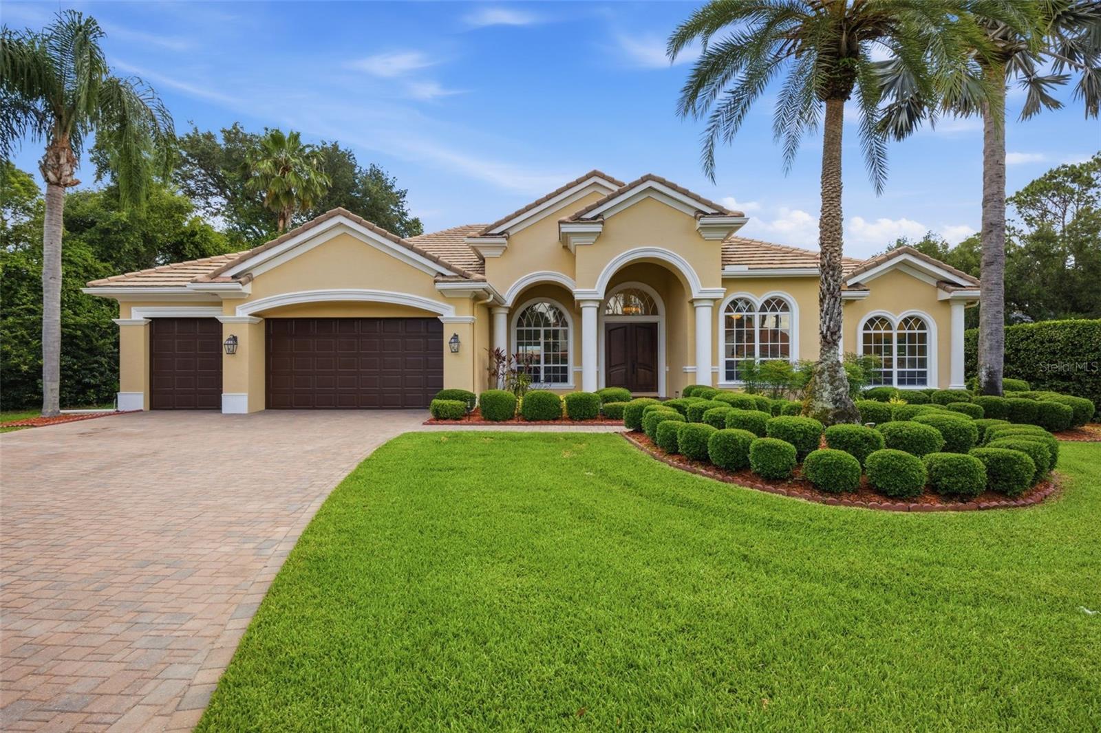 .5 acre lot with extended pavered driveway