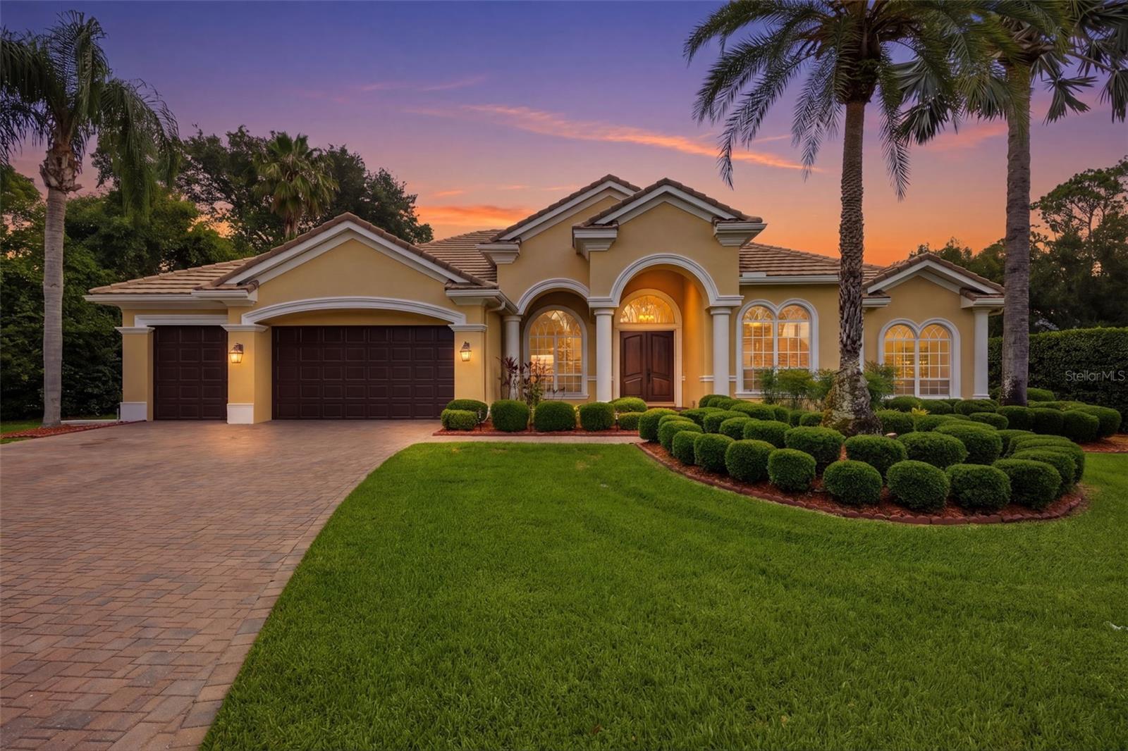 .5 acre lot with extended pavered driveway