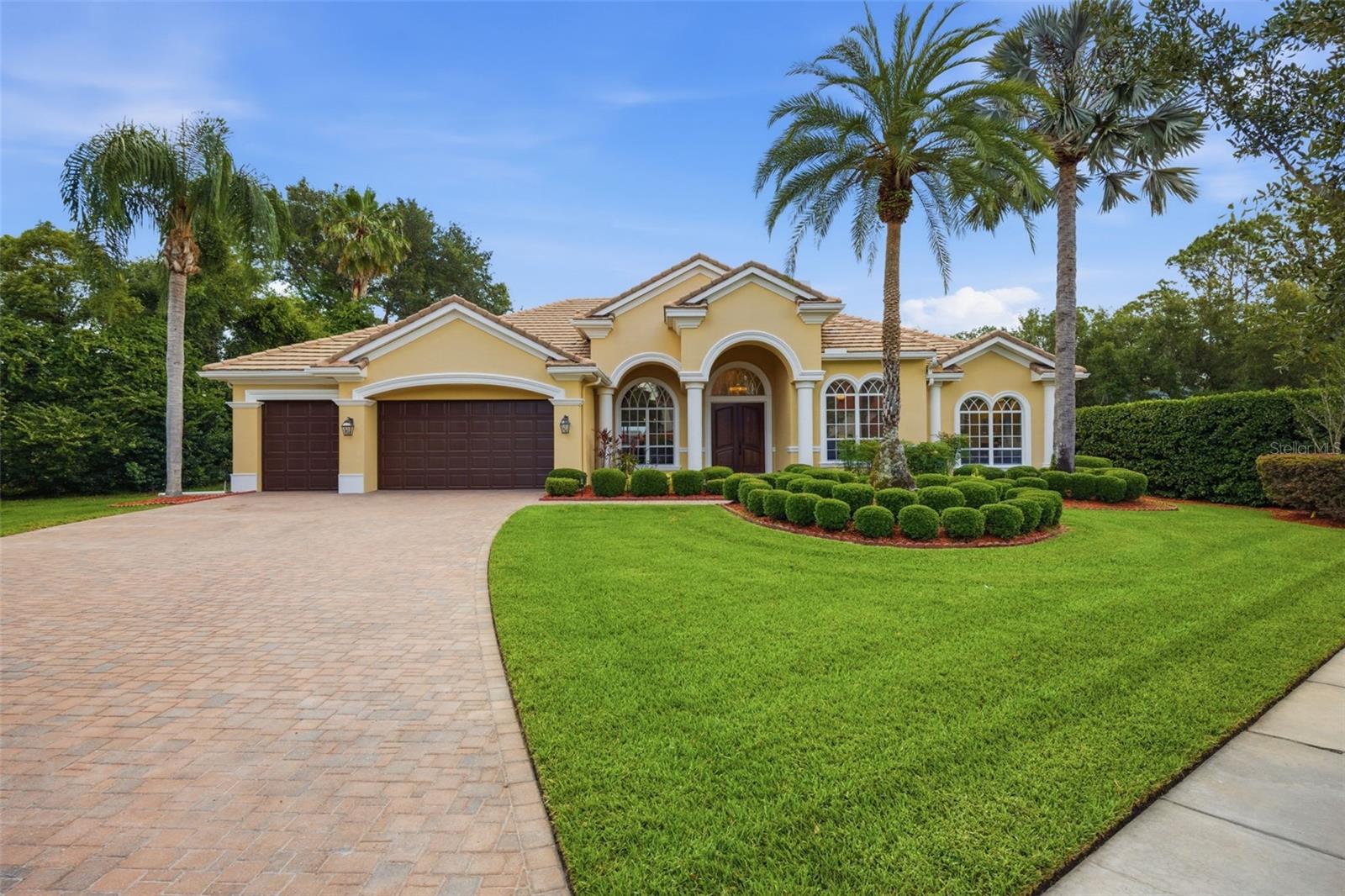 .5 acre lot with extended pavered driveway