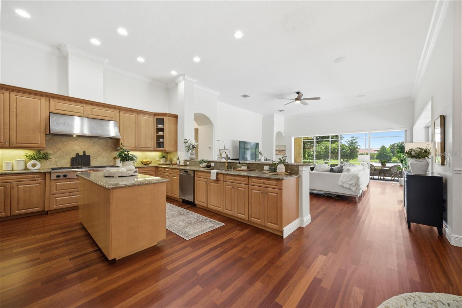 Kitchen featuring new stainless appliances