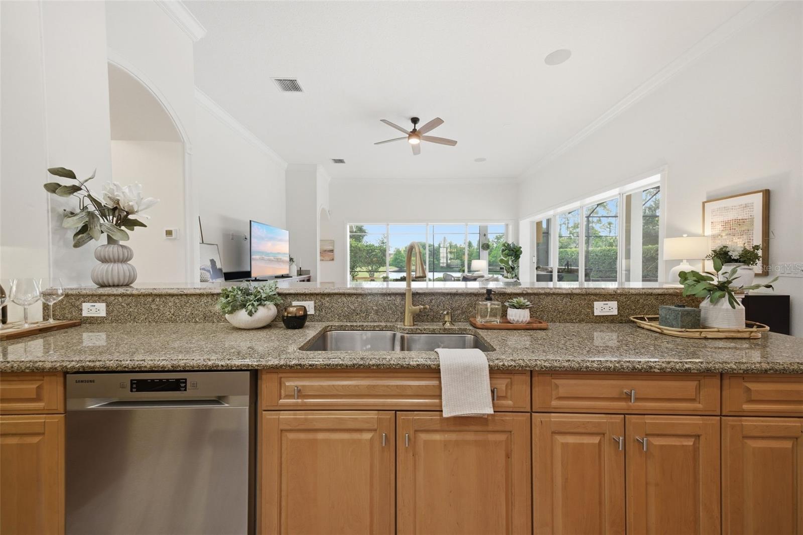 Kitchen featuring new stainless appliances