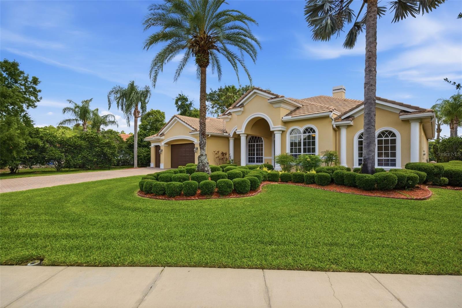 .5 acre lot with extended pavered driveway