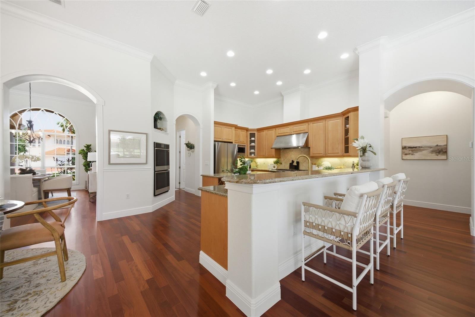 Kitchen featuring new stainless appliances