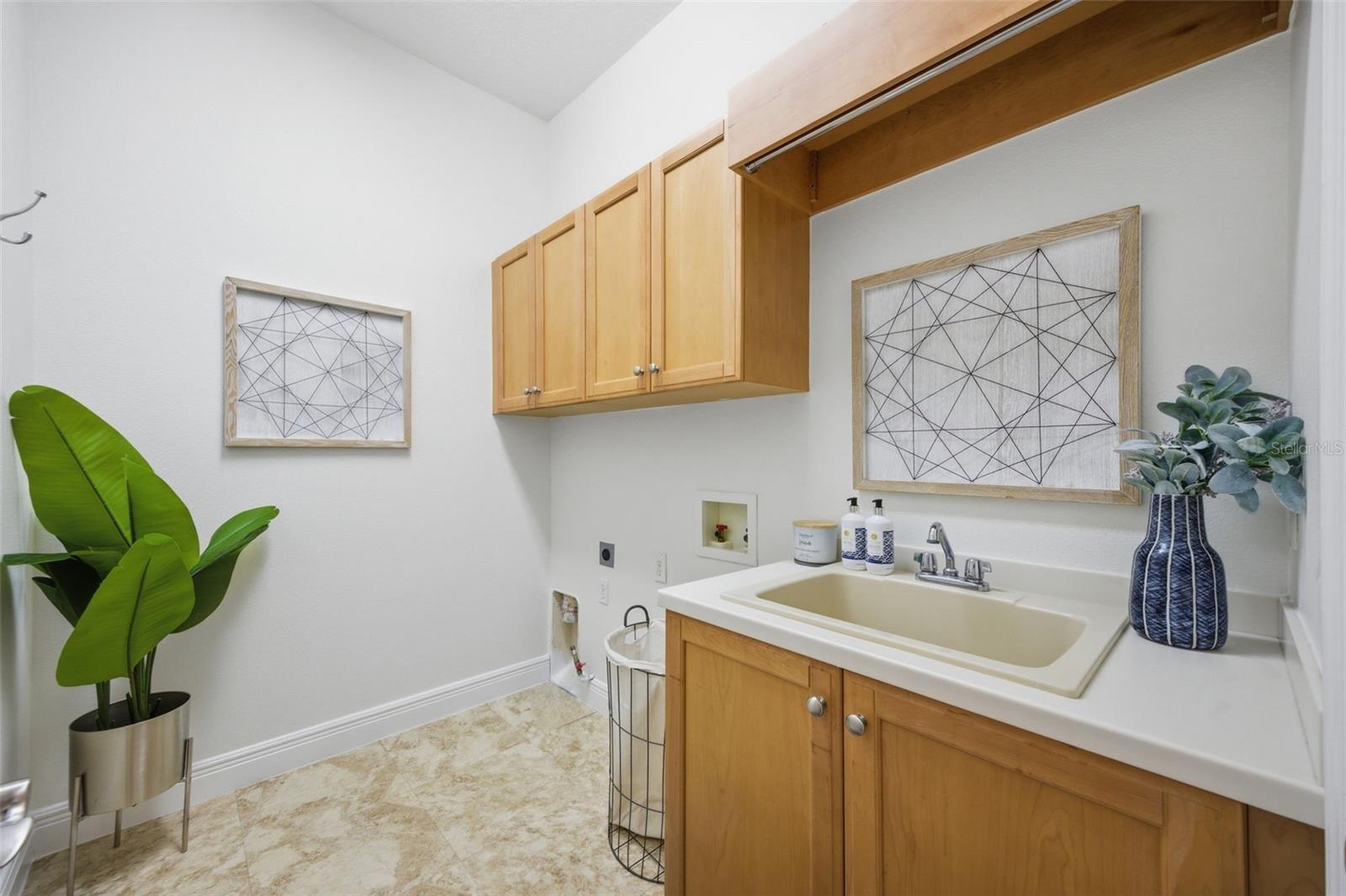 Laundry room with utility sink