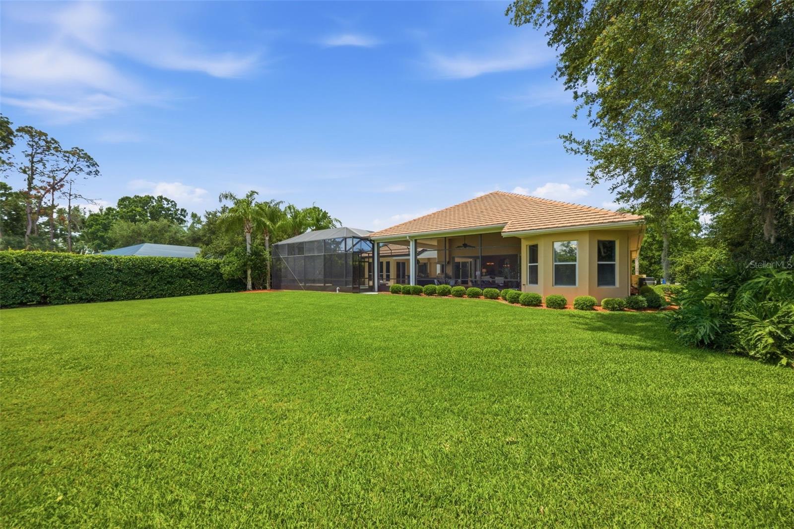 .5 acre lot allows for a HUGE backyard overlooking pond