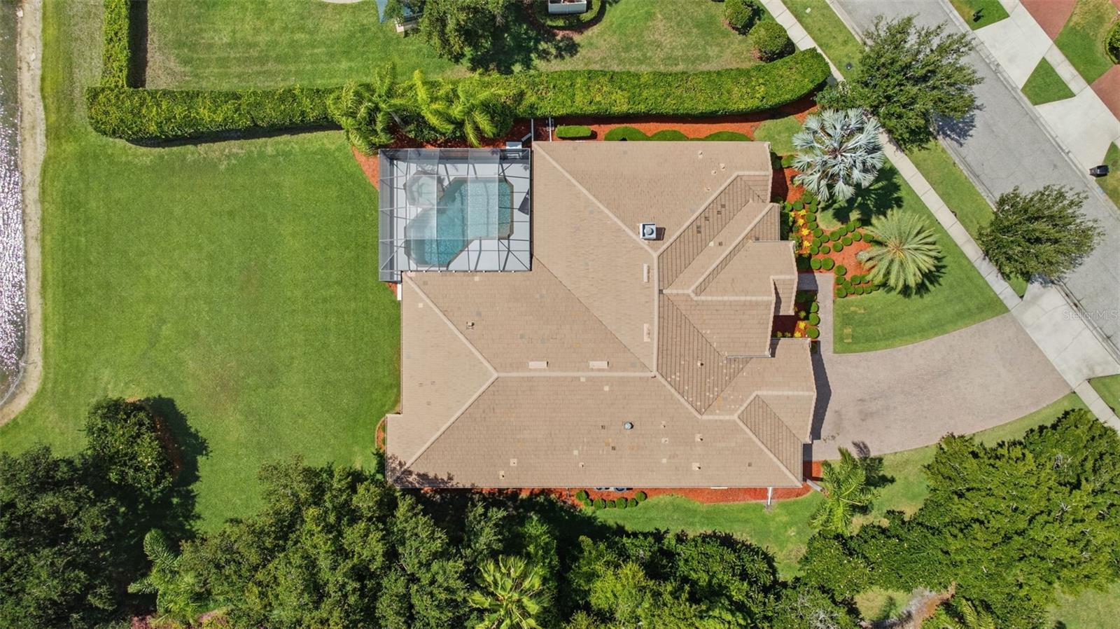 Rare .5 acre pond view lot  convenient to Tree Tops playground and basketball court