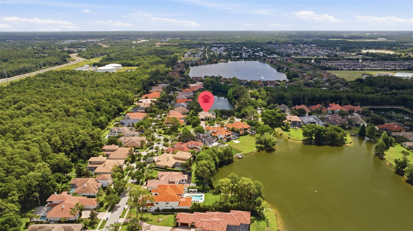 Rare .5 acre pond view lot  convenient to Tree Tops playground and basketball court
