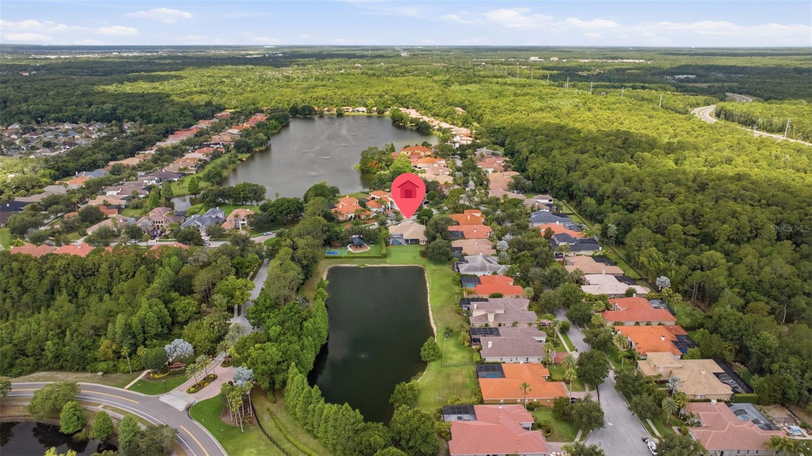 Rare .5 acre pond view lot  convenient to Tree Tops playground and basketball court