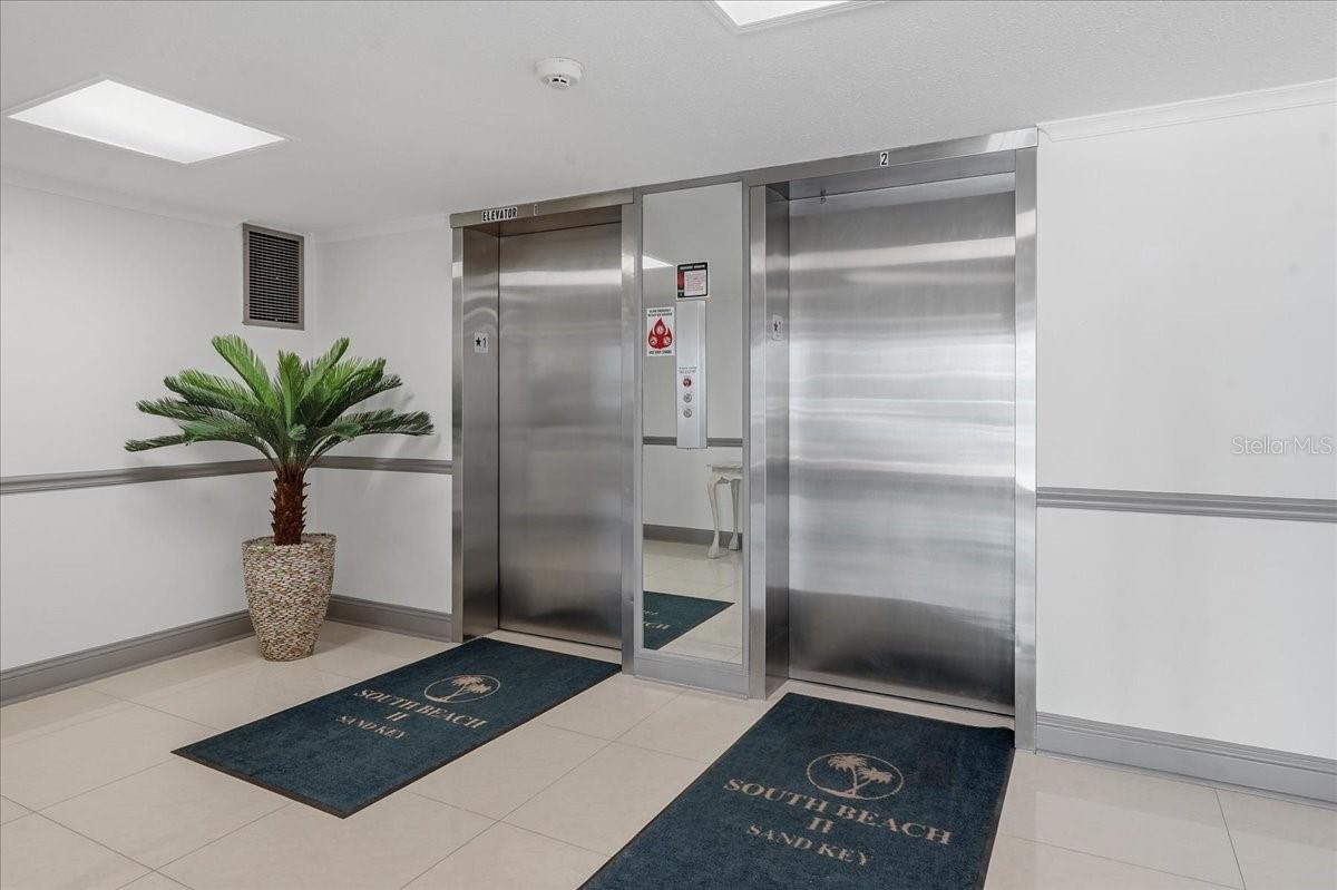 BUILDING ELEVATORS
