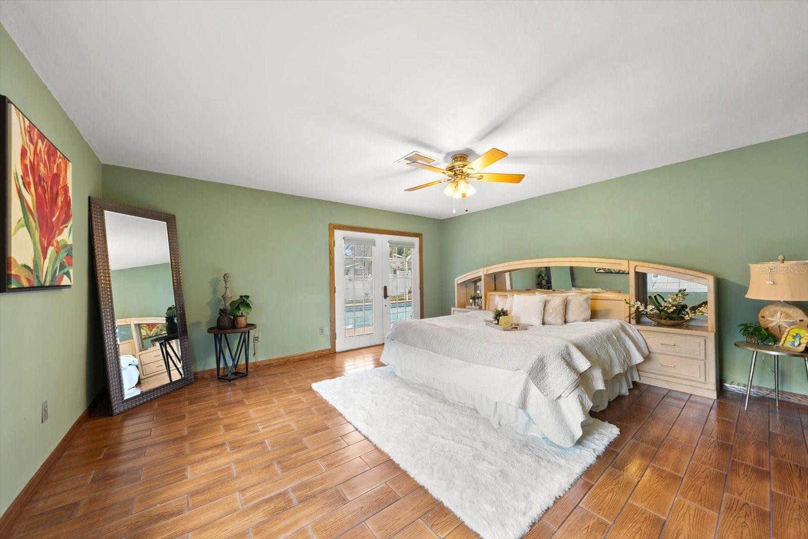 For ultimate privacy and functionality, this expansive retreat features a dedicated ensuite bath and dual closets, providing ample storage and a true suite experience.